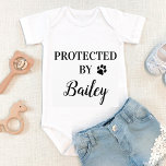 Personalized Protected By Dog Baby Bodysuit<br><div class="desc">Protected By, Dog Security ! Let everyone know of your best dog and newly appointed guard dog in the welcoming home of your new baby with this cute dog baby clothes. “Protected By... your dogs name" with paw print. Perfect baby shower gift to a dog mom, this dog lover baby...</div>