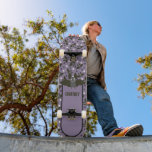 Personalized Purple, Charcoal Gray Cartoon Bat Skateboard<br><div class="desc">Add a name or other text to create your own personalized skateboard. This board features a cute cartoon illustration of a bat against a smoky purple colored background all accented by a fun bats and polka dots pattern.</div>
