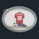 Personalized Red and White Football Soccer Jersey Belt Buckle<br><div class="desc">A fresh new version of GiftsBonanza's unique football soccer jersey sports design featuring a red and white soccer jersey hanging in a locker room with a soccer ball, water bottle and football cleats on the bench. The soccer jersey has customizable text for the name of the soccer player, soccer coach...</div>