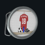 Personalized Red and White Football Soccer Jersey Belt Buckle<br><div class="desc">A fresh new version of GiftsBonanza's unique football soccer jersey sports design featuring a red and white soccer jersey hanging in a locker room with a soccer ball, water bottle and football cleats on the bench. The soccer jersey has customizable text for the name of the soccer player, soccer coach...</div>