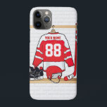 Personalized Red and White Ice Hockey Jersey iPhone 11 Pro Case<br><div class="desc">A unique and fun sports design with a personalized ice hockey jersey hanging in a locker room with a helmet, ice skates and a hockey stick. The jersey can be fully personalized with the number and name of your choice to make a great gift for any ice hockey fan, ice...</div>