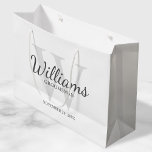 Personalized Script Groomsmen's name and Monogram Large Gift Bag<br><div class="desc">Add a personal touch to your wedding with personalized groomsmen gift bag. This gift bag features personalized groomsman's name in grey classic script font style with wedding details in grey classic serif font style and monogram in light grey classic serif font style as background, on white background. Also perfect for...</div>