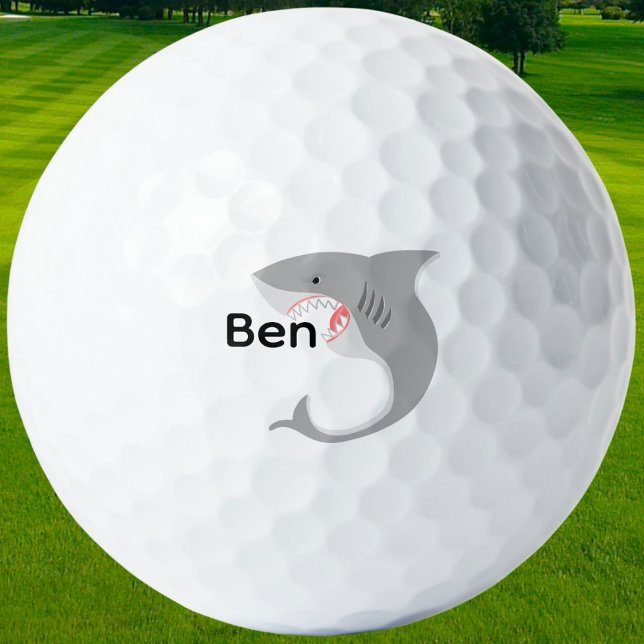 Personalized Shark Eating Name Golf Balls (Make a splash on the course with custom golf balls featuring a fierce shark chomping your name.)