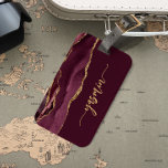 Personalized Signature Burgundy Red Gold Agate Luggage Tag<br><div class="desc">Personalize this elegant modern design with your name in vertical gold-colored signature handwriting script on a burgundy red background with a border of burgundy watercolor agate trimmed with gold faux glitter. (To keep the swashes at the beginning and end of the name, replace only the letters, leaving the symbols in...</div>