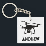 Personalized Simple Black Drone Illustration Keychain<br><div class="desc">Surprise your favorite drone enthusiast with this simple, personalized gift. They'll love keeping their keys organized or adding a personalized tag to their backpack with this keychain. It features a simple, hand drawn style illustration of a drone aircraft in black and your own name or custom message in matching black...</div>