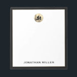 Personalized Simple Luxury Monogram Notepad<br><div class="desc">Elevate your note-taking with this personalized simple luxury monogram notepad. The design features two overlapping monogram initials in classic block typography on a brushed metallic gold emblem at the top, with your name in classic typography on a clean white background framed in black. Perfect for jotting down notes, to-do lists,...</div>