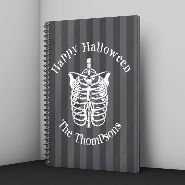 Personalized Skeleton Happy Halloween Notebook (Halloween notebook with skeleton ribcage illustration and striped background personalized with name.)