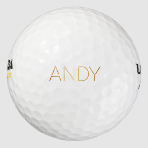 Personalized Stencil Font Andy Gold on Black Golf Balls