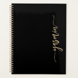 Personalized Stylish Signature Black Gold Planner<br><div class="desc">Personalize this elegant modern design with your name in vertical gold-colored signature handwriting script on a black background. (To keep the swashes at the beginning and end of the name,  replace only the letters,  leaving the symbols in place.)</div>