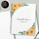 Personalized Sunflower Eucalyptus 2023 Planner<br><div class="desc">This floral Planner is decorated with watercolor sunflowers and green eucalyptus leaves on a white background.
You can personalize it by adding your name,  monogram,  and year.
Because we create our own artwork you won't find this exact image from other designers.
Original Watercolor © Michele Davies.</div>