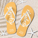 Personalized Team Bride Orange and White Flip Flops<br><div class="desc">Light orange and white - or any color - flip flops personalized with your name and "Team Bride" or any wording you choose. Great bridesmaid gift, bachelorette party, flat shoes for the wedding reception, or a fun bridal shower favor. Change the color straps and footbed, too! More colors done for...</div>