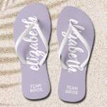 Personalized Team Bride Periwinkle and White Flip Flops<br><div class="desc">Periwinkle and white - or any color - flip flops personalized with your name and "Team Bride" or any wording you choose. Great bridesmaid gift, bachelorette party, flat shoes for the wedding reception, or a fun bridal shower favor. Change the color straps and footbed, too! More colors done for you...</div>
