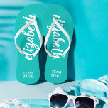 Personalized Team Bride Turquoise and White Flip Flops<br><div class="desc">Turquoise and white - or any color - flip flops personalized with your name and "Team Bride" or any wording you choose. Great bridesmaid gift, bachelorette party, flat shoes for the wedding reception, or a fun bridal shower favor. Change the color straps and footbed, too! More colors done for you...</div>