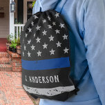 Personalized Thin Blue Line Police Drawstring Bag<br><div class="desc">Thin Blue Line Backpack - American flag in Police Flag colors, distressed design . Personalize with police officer name. This personalized police drawstring bag is perfect for police and law enforcement families and all those who support them. A great police graduation or law enforcement retirement gift. COPYRIGHT © 2020 Judy...</div>