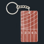 Personalized Track and Field Keychain<br><div class="desc">Stay in your lane. This personalized sports themed keychain features a distressed style illustration of a red running track starting line. The back of the keychain is gray with a space to personalize this for your favorite coach or athlete. Makes a fun end of the season gift. It’s perfect for...</div>