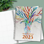 Personalized Tree of Life  2023 Planner<br><div class="desc">This unique Planner is decorated with a brightly coloured Tree of Life on a pale gray background. The original design was made in mosaic using tiny pieces of brightly colored glass. Customize it with your name and year. To edit further use the Design Tool to change the font, font size,...</div>