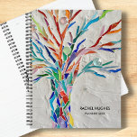 Personalized Tree Planner<br><div class="desc">This unique Planner is decorated with an original mosaic tree in bright colors on a gray background.
Easily customizable.
Use the Design Tool to change the text size,  style,  or color.
As we create our artwork you won't find this exact image from other designers.
Original Mosaic © Michele Davies.</div>