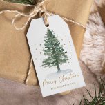 Personalized Watercolor Pine Tree Christmas Gift Tags<br><div class="desc">This personalized holiday gift tag features a watercolor pine Christmas tree accented with tiny gold stars,  and gold script Merry Christmas,  along with the family name.</div>