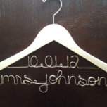 Personalized Wedding Dress Hanger<br><div class="desc">This wedding dress hanger, personalized and customized, will make those photos of your wedding dress look amazing! This white wood hanger features the bride's future last name and the wedding date, but can be personalized however you want. This is a fantastic gift for a bride or a wonderful treat for...</div>