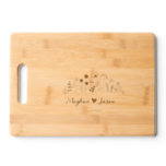 Personalized Wedding Gift couples names Cutting Board<br><div class="desc">Make their wedding day extra special with our personalized cutting board, the perfect gift for the happy couple. Crafted with precision and personalized with their names and wedding date, this cutting board is a beautiful addition to any kitchen. Whether they're chopping vegetables or serving cheese and charcuterie, this custom cutting...</div>
