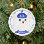 Personalized White Long Haired Chihuahua Hanukkah Ceramic Ornament<br><div class="desc">Celebrate your favorite mensch on a bench with personalized ornament! This design features a sweet illustration of a white long haired chihuahua dog with a blue and white yarmulke. For the most thoughtful gifts, pair it with another item from my collection! To see more work and learn about this artist,...</div>