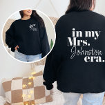 Personalized Wife Era Bride Honeymoon Trendy Cool Sweatshirt<br><div class="desc">Step into the Wife Era with our Personalized Wife Era Bride Honeymoon Trendy Cool Sweatshirt – a perfect blend of retro charm and modern style. This sweatshirt is not just an outfit; it's a personalized statement for the bride embarking on her journey to becoming a wife. Designed with a trendy...</div>