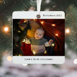 Personalized With Photo Baby's First Christmas Metal Ornament<br><div class="desc">Celebrate your little one's very first holiday season with the Personalized With Photo Baby's First Christmas Metal Ornament. This shatterproof metal ornament is the perfect keepsake to honor your baby's first Christmas, featuring two cherished family photos that will warm your heart year after year. With its sleek design and personalized...</div>