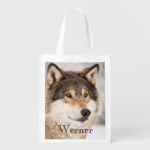 Personalized wolf face in a winter forest grocery bag