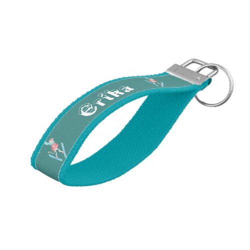 Personalized wrist keychain with a ski jumping cow