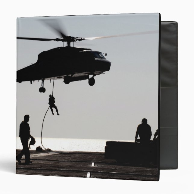 Personnel fast-rope out of an SH-60F Binder (Front/Inside)