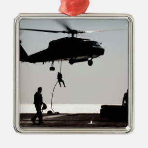 Personnel fast-rope out of an SH-60F Metal Ornament
