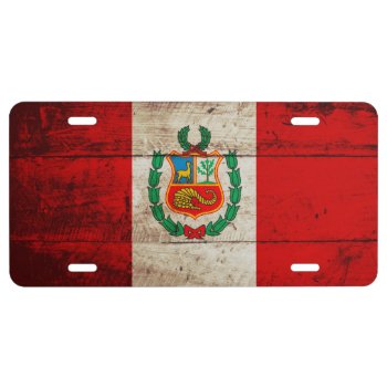 Peru Flag On Old Wood Grain License Plate by electrosky at Zazzle