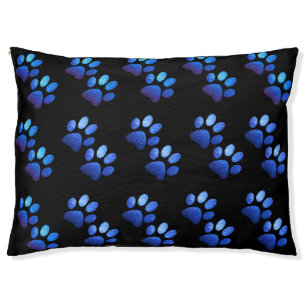 Pet paw bright blue glitter on black background   bed