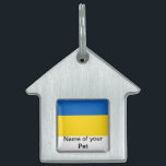 Pet Tag with Flag of Ukraine<br><div class="desc">Add a touch of Ukrainian pride to your pet's accessories with our exclusive pet tag featuring the flag of Ukraine! Crafted with meticulous attention to detail, this pet tag is not just a functional item; it’s a celebration of Ukrainian heritage and cultural pride. The vibrant design prominently displays the iconic...</div>
