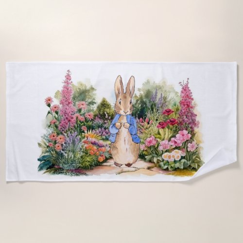 Peter the rabbit in his flower garden beach towel
