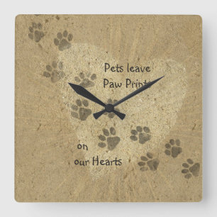 Pets leave Paw Prints on our Hearts Clock