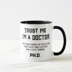 PHD Graduate Degree Funny Quote Not A Doctor Mug