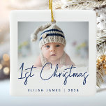 Photo Baby's First Christmas Navy Blue Script Ceramic Ornament<br><div class="desc">Celebrate baby's first Christmas with this modern minimalist photo keepsake ornament. The navy blue text reads "1st Christmas" in trendy handwriting script. Easily replace the sample image with your favorite photo,  and add baby's name and the year below. A white gradient screen helps make the text overlay pop.</div>