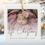 Photo Baby's First Christmas Rose Script Ceramic Ceramic Ornament<br><div class="desc">Celebrate baby's first Christmas with this modern minimalist photo keepsake ornament. The dusty rose text reads "1st Christmas" in trendy handwriting script. Easily replace the sample image with your favorite photo,  and add baby's name and the year below. A white gradient screen helps make the text overlay pop.</div>