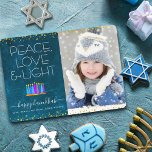Photo Blue Hanukkah Menorah Peace Love Light Type Holiday Card<br><div class="desc">“Peace, love & light.” A playful, modern, artsy illustration of boho pattern candles in a menorah helps you usher in the holiday of Hanukkah, along with the custom photo of your choice. Assorted blue candles with colorful faux foil patterns overlay a rich, deep teal blue marble watercolor background. Faux gold...</div>
