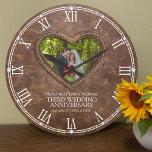 Photo brown leather heart 3rd wedding anniversary  large clock<br><div class="desc">Brown leather printed faux graphic stitched heart wedding anniversary clock, with graphic style crystals on each hour, customize with your own couples photo, year of marriage, and names or relationship to you. The example reads Maria and Preston Martinez Third Wedding Anniversary and your marriage and anniversary date or message. The...</div>