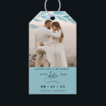 Photo, Dusty Blue Leaves Wedding Save the Date Gift Tags<br><div class="desc">Delight your guests announcing your wedding date with a gift; they will love hearing the news and enjoy the nice detail! Photo gift tag with attractive watercolor dusty blue colored leaves photo overlay on the top framing your photograph. Dusty blue section on the bottom with modern hand written calligraphy details,...</div>