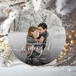 Photo First Christmas Engaged White Script Ornament<br><div class="desc">Commemorate your engagement with this beautiful modern keepsake ornament. The white text reads "Our first Christmas engaged, " with the word "engaged" in elegant handwriting script with flourishes before and after. Replace the sample image with your favorite photo, and add your names and the year. A dark gradient filter helps...</div>