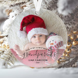 Photo Grandparents First Christmas Black Script Ornament<br><div class="desc">Help them celebrate their first grandchild with this beautiful modern keepsake ornament. The off-black text reads "Our first Christmas as grandparents, " with the word "grandparents" in elegant handwriting script with flourishes before and after. Easily replace the sample image with your favorite photo of the new baby, and add his...</div>