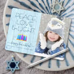 Photo Hanukkah Menorah Peace Love Light Rustic Holiday Card<br><div class="desc">“Peace, love & light.” A playful, modern, artsy illustration of boho pattern candles in a menorah helps you usher in the holiday of Hanukkah, along with the custom photo of your choice. Assorted blue candles with colorful faux foil patterns overlay a light blue rustic wood background. Faux gold foil confetti...</div>