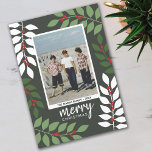 Photo modern berries eucalyptus branches Christmas Holiday Card<br><div class="desc">A modern Merry Christmas photo card in green,  red and white.  The modern,  abstract design includes eucalyptus branches and berries and sans serif type for the main part of the text. The greeting is in a rustic modern script. The back includes a eucalyptus pattern in greens and white.</div>
