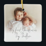 Photo Name Year First Christmas Big Brother Cerami Ceramic Ornament<br><div class="desc">Photo Overlay Names Year First Christmas As Big Brother. To celebrate your new baby and older brother, with an elegant set script for First Christmas. Choose your favorite photo to replace the sample picture. Changes to colors of text can be made to better suit your photo if necessary via the...</div>