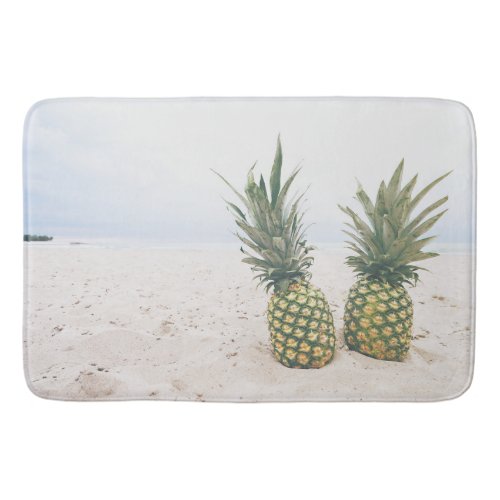 Photo of 2 Pineapples on a Beach Bath Mat
