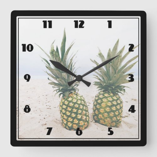 Photo of 2 Pineapples on a Beach Square Wall Clock