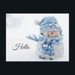 Photo of a Cute Snowman in Winter - Hello Postcard<br><div class="desc">A postcard with a cute photograph of a little snowman. Standing outside in the winter with snow falling all around. This cute little guy is dressed up in blue knitted hat and scarf.</div>